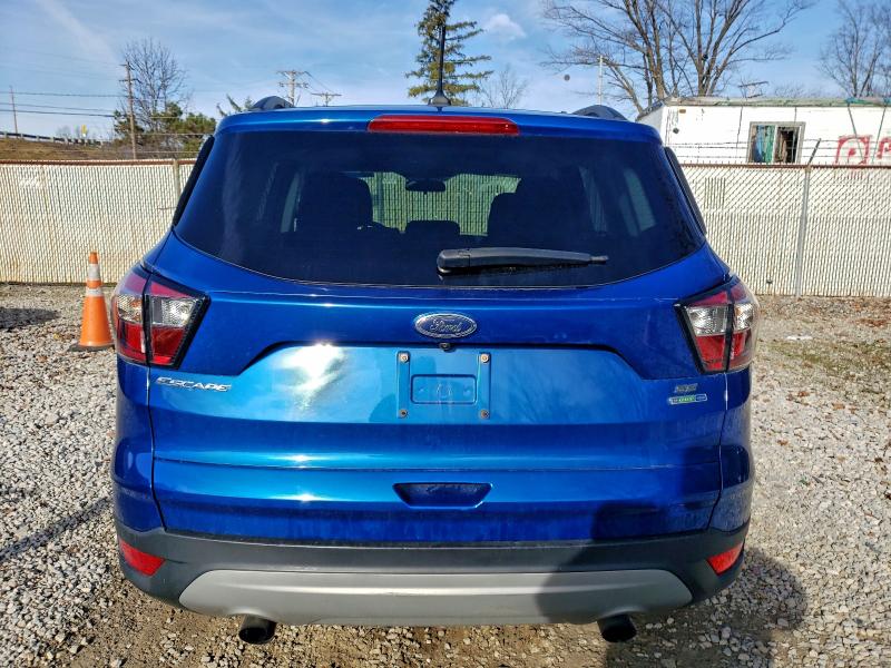 Photo 6 from auction – 2018 FORD ESCAPE SE with VIN 1FMCU9GD6JUA08219