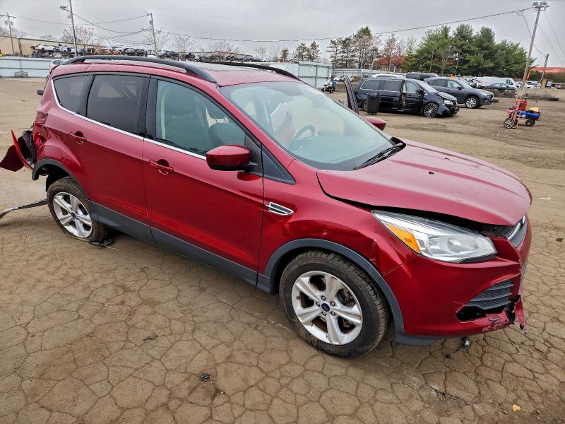 Photo 4 from auction – 2016 FORD ESCAPE SE with VIN 1FMCU9GX4GUB50605