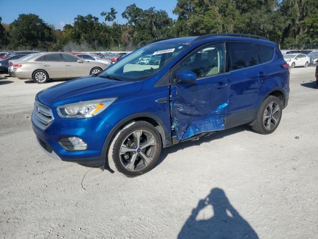 FORD ESCAPE 2018 with VIN 1FMCU0HD4JUA79686 - Photo from auction