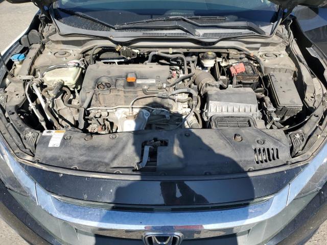 Photo 11 from auction – 2017 HONDA CIVIC EX with VIN 2HGFC2F70HH502646