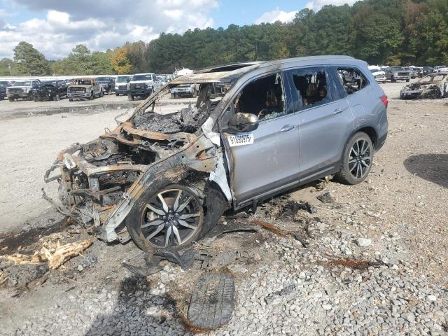 HONDA PILOT TOUR 2021 with VIN 5FNYF5H61MB019686 - Photo from auction