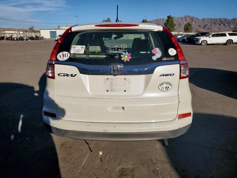 Photo 6 from auction – 2016 HONDA CR-V LX with VIN 5J6RM4H30GL014906