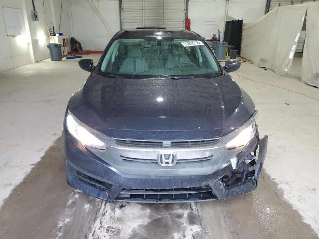 Photo 5 from auction – 2017 HONDA CIVIC LX with VIN 19XFC2F50HE042221