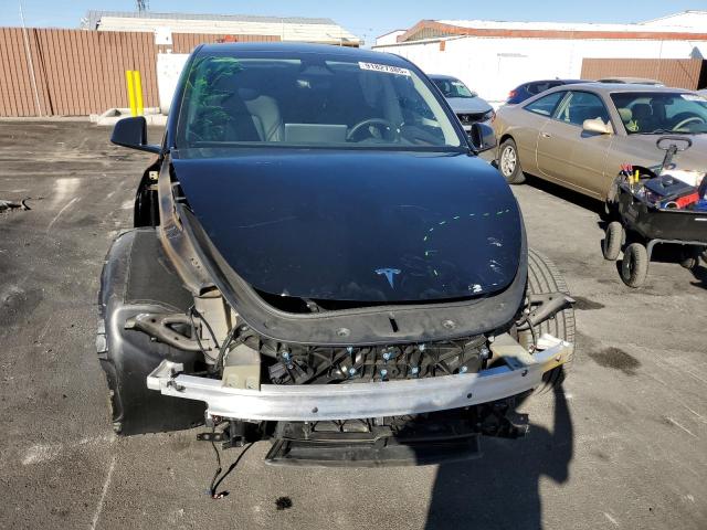 Photo 5 from auction – 2025 TESLA MODEL Y with VIN 7SAYGDEE5SF233065