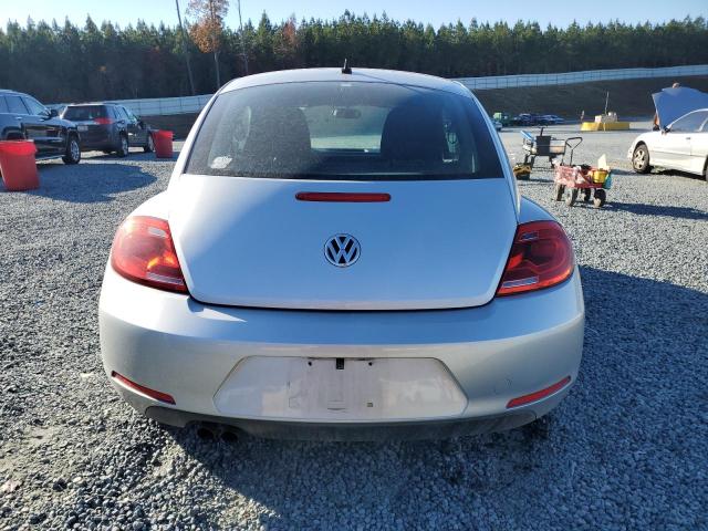 Photo 6 from auction – 2014 VOLKSWAGEN BEETLE with VIN 3VWFP7AT1EM629971