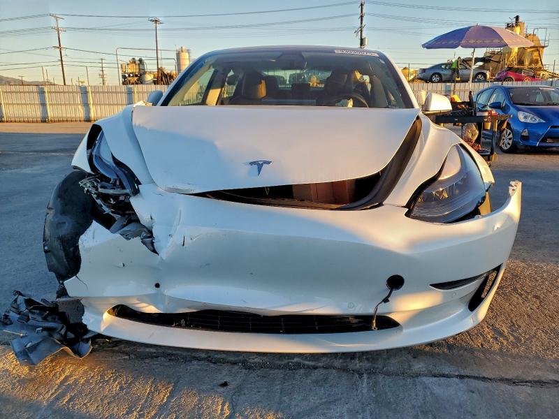 Photo 5 from auction – 2021 TESLA MODEL 3 with VIN 5YJ3E1EA2MF874136