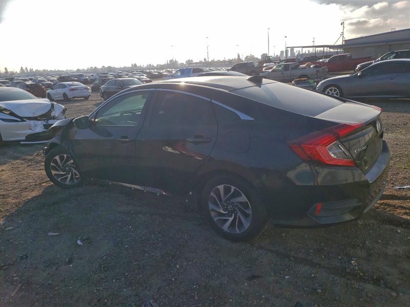 Photo 2 from auction – 2017 HONDA CIVIC EX with VIN 2HGFC2F76HH510461