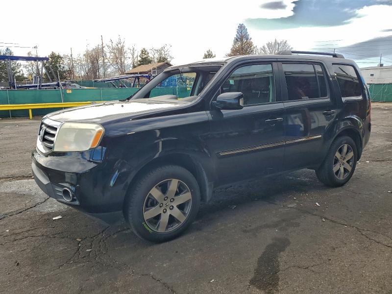 HONDA PILOT TOUR 2014 with VIN 5FNYF3H90EB008209 - Photo from auction