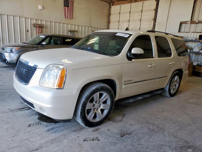 GMC YUKON SLT 2011 with VIN 1GKS1CE06BR378939 - Photo from auction