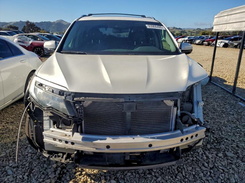 Photo 5 from auction – 2017 HONDA PILOT TOUR with VIN 5FNYF6H98HB012675