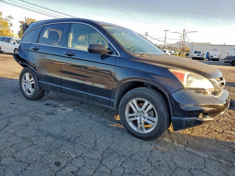 Photo 4 from auction – 2011 HONDA CR-V EXL with VIN 5J6RE3H72BL042354