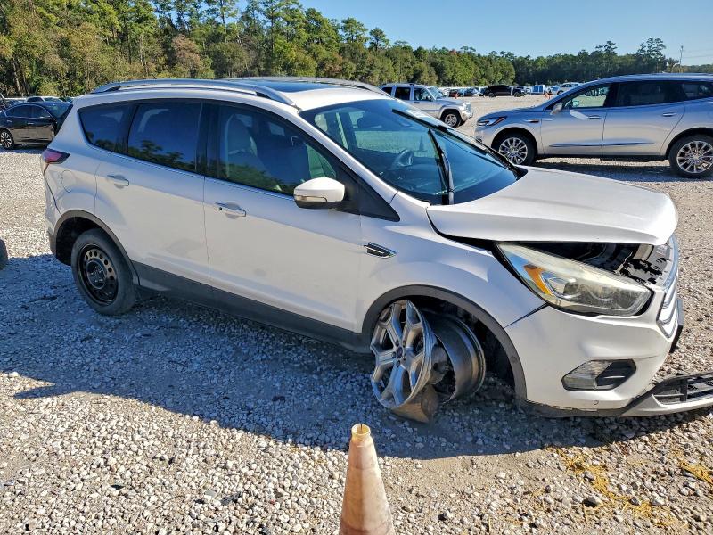 Foto 4 de la subasta – 2017 FORD ESCAPE TIT con VIN 1FMCU0J96HUE15449