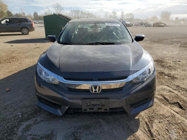 Photo 5 from auction – 2018 HONDA CIVIC LX with VIN 19XFC2F53JE024723