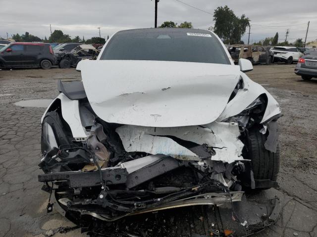 Photo 5 from auction – 2022 TESLA MODEL Y with VIN 7SAYGDEF0NF411753