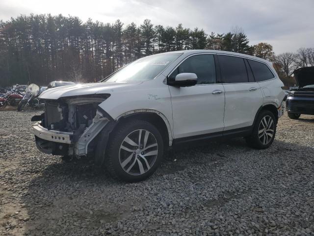 HONDA PILOT TOUR 2017 with VIN 5FNYF6H96HB072678 - Photo from auction