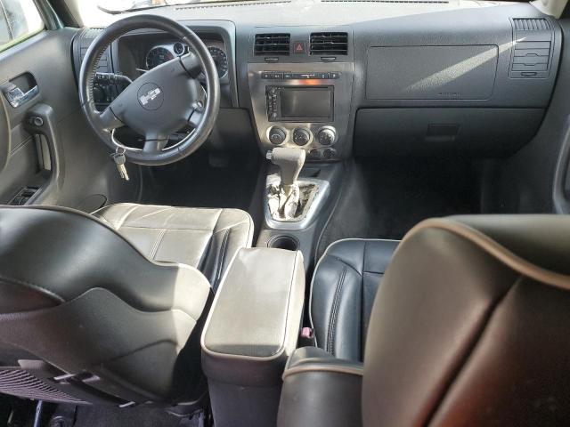 Photo 8 from auction – 2006 HUMMER H3 with VIN 5GTDN136268310744