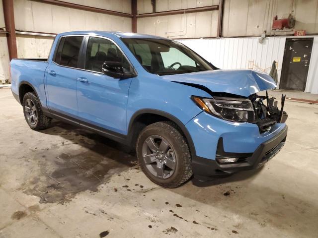 Photo 4 from auction – 2024 HONDA RIDGELINE with VIN 5FPYK3F66RB015232