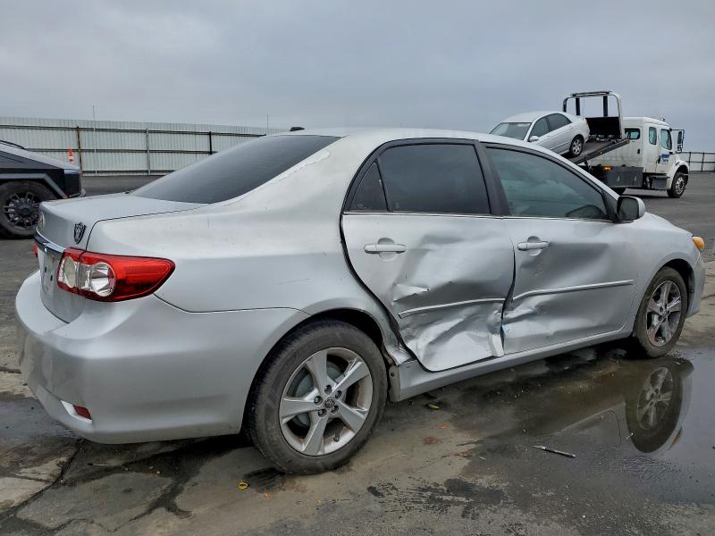 Photo 3 from auction – 2013 TOYOTA CAROLLA with VIN 2T1BU4EE9DC991395