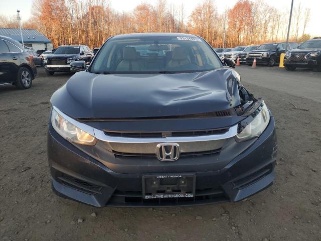 Photo 5 from auction – 2017 HONDA CIVIC EX with VIN 19XFC2F78HE232916