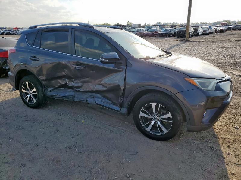 Photo 4 from auction – 2017 TOYOTA RAV4 XLE with VIN JTMWFREV2HJ132393