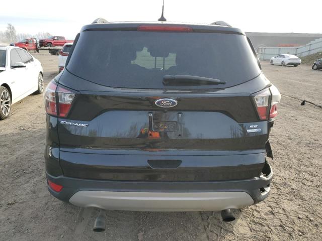 Photo 6 from auction – 2018 FORD ESCAPE SE with VIN 1FMCU9GD4JUD24234