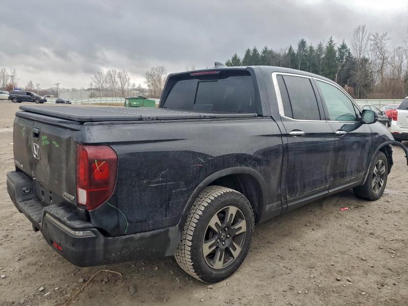 Photo 3 from auction – 2018 HONDA RIDGELINE with VIN 5FPYK3F73JB010566