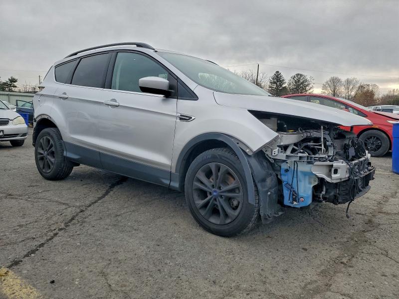 Photo 4 from auction – 2018 FORD ESCAPE SE with VIN 1FMCU0GD2JUB34282