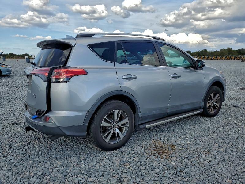 Photo 3 from auction – 2017 TOYOTA RAV4 with VIN 2T3RFREV8HW690750