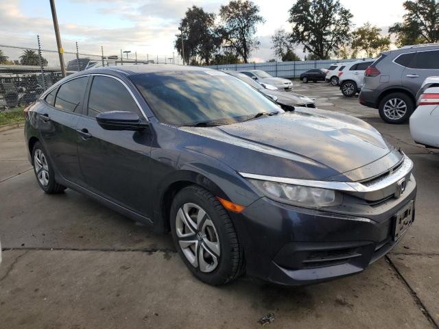 Photo 4 from auction – 2018 HONDA CIVIC LX with VIN 2HGFC2F54JH609686
