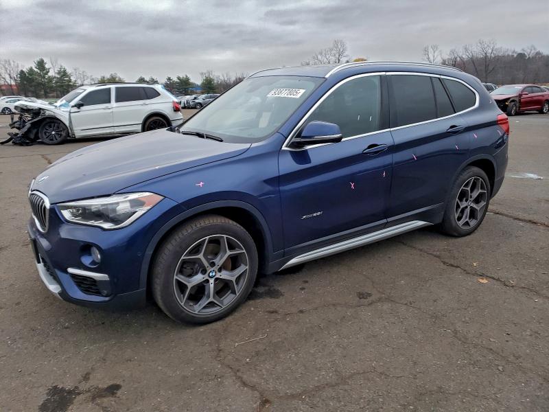 BMW X1 XDRIVE2 2016 with VIN WBXHT3C39G5E52372 - Photo from auction