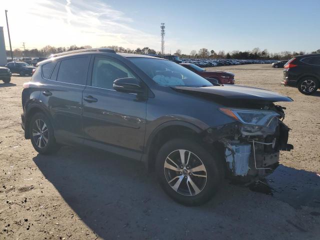 Photo 4 from auction – 2017 TOYOTA RAV4 XLE with VIN JTMRFREV3HJ709476