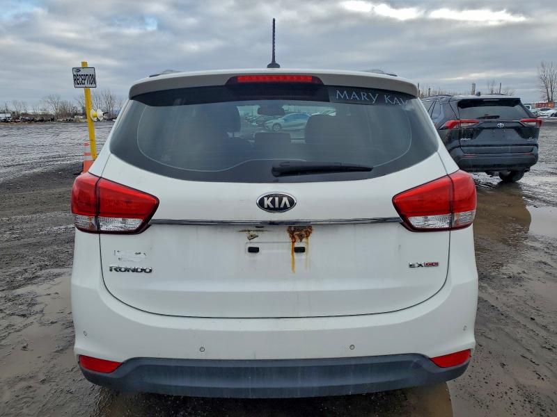 Photo 6 from auction – 2014 KIA RONDO with VIN KNAHU8A36E7014706