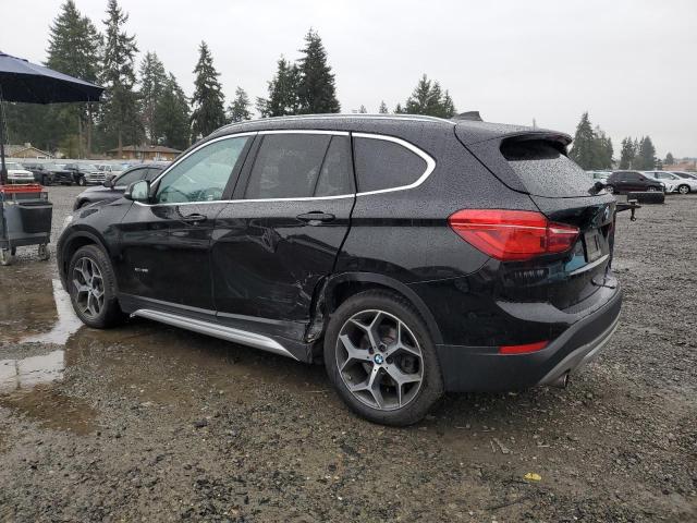 Photo 2 from auction – 2018 BMW X1 XDRIVE2 with VIN WBXHT3C31J5L26804