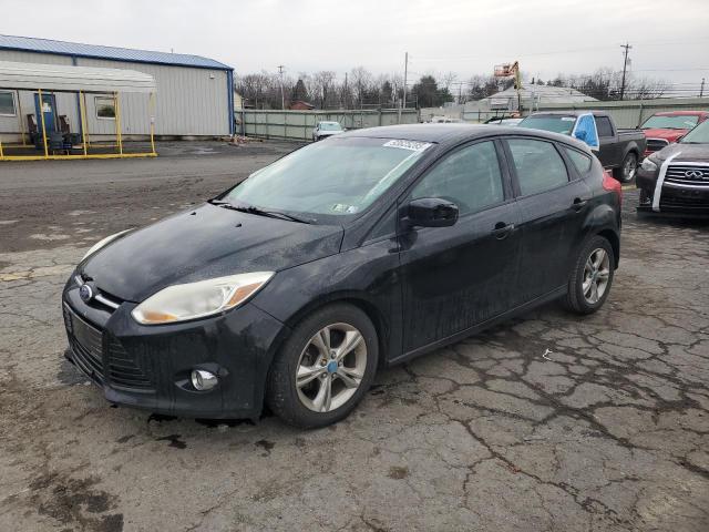 FORD FOCUS SE 2012 with VIN 1FAHP3K21CL260043 - Photo from auction