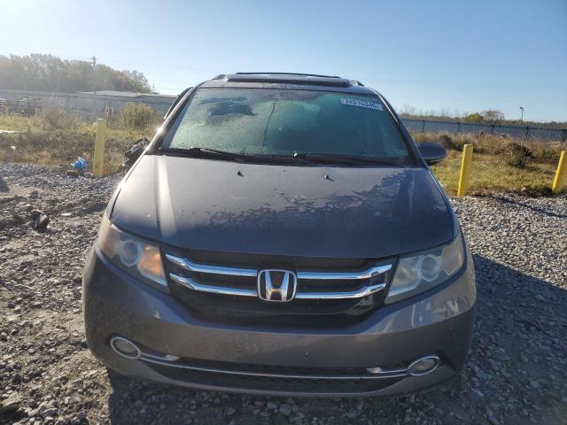 Photo 5 from auction – 2014 HONDA ODYSSEY TO with VIN 5FNRL5H91EB049697
