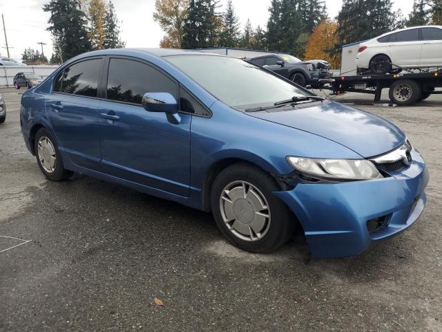 Photo 4 from auction – 2011 HONDA CIVIC HYBR with VIN JHMFA3F28BS000562