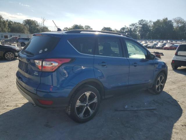 Photo 3 from auction – 2018 FORD ESCAPE with VIN 1FMCU0HD4JUA79686