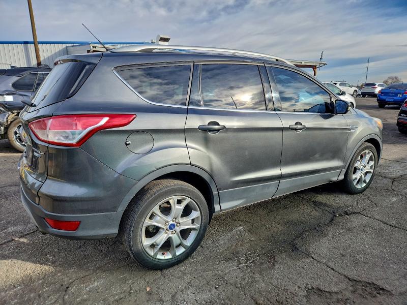 Photo 3 from auction – 2015 FORD ESCAPE TIT with VIN 1FMCU9J99FUB72575