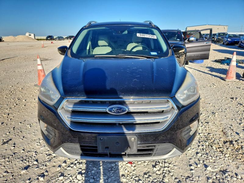 Photo 5 from auction – 2017 FORD ESCAPE TIT with VIN 1FMCU0J90HUE93905