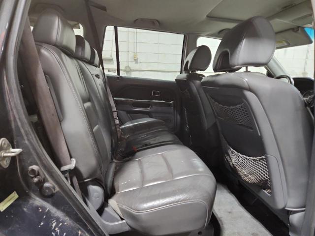 Photo 11 from auction – 2006 HONDA PILOT EX with VIN 2HKYF18596H503061