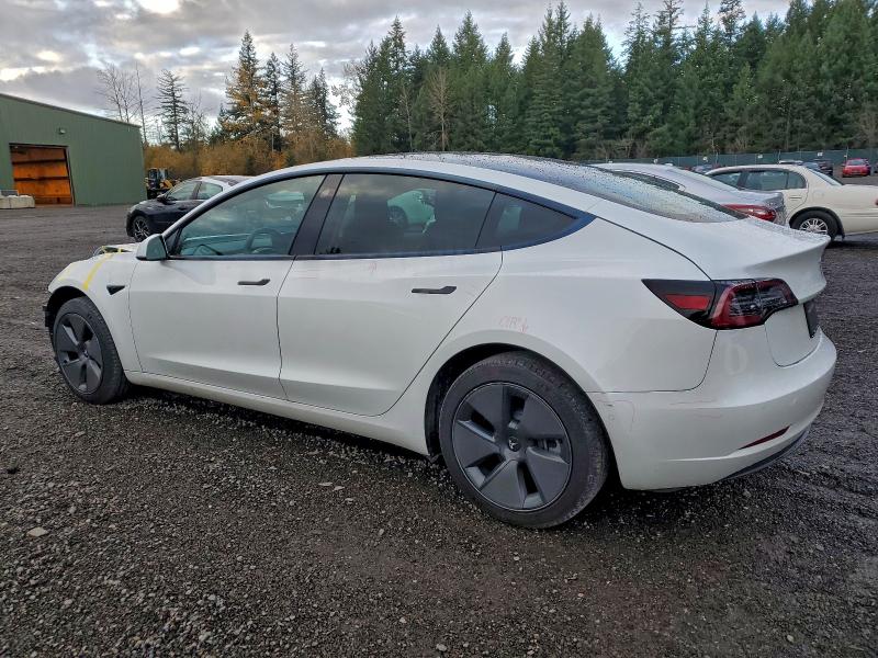 Photo 2 from auction – 2021 TESLA MODEL 3 with VIN 5YJ3E1EA8MF877025