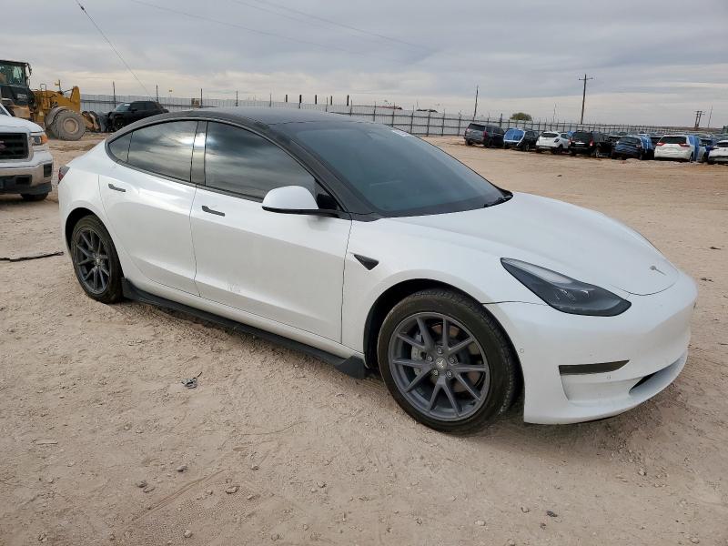 Photo 4 from auction – 2021 TESLA MODEL 3 with VIN 5YJ3E1EA3MF100736