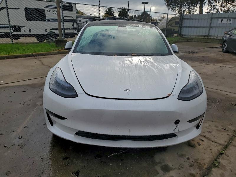 Photo 5 from auction – 2023 TESLA MODEL 3 with VIN 5YJ3E1EA4PF664013