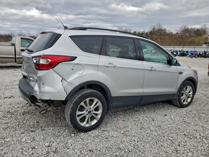 Photo 3 from auction – 2019 FORD ESCAPE with VIN 1FMCU0HD3KUC56634