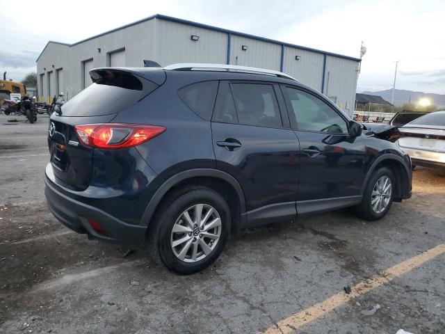 Photo 3 from auction – 2015 MAZDA CX-5 TOURI with VIN JM3KE2CY5F0532688