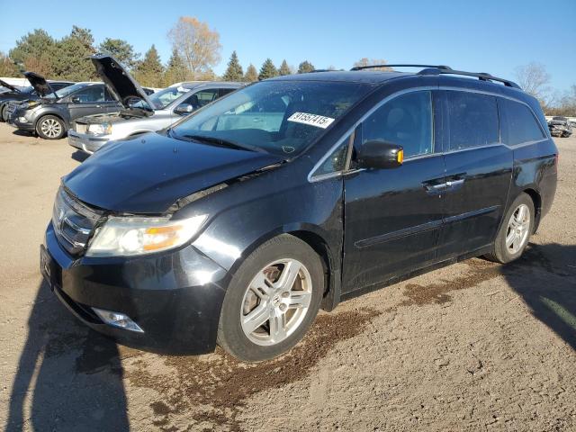 HONDA ODYSSEY TO 2012 with VIN 5FNRL5H94CB079872 - Photo from auction