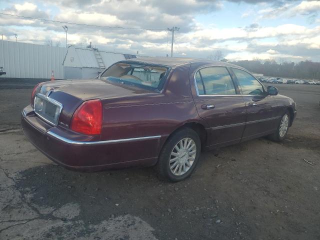 Photo 3 from auction – 2004 LINCOLN TOWN CAR E with VIN 1LNHM81W04Y662172
