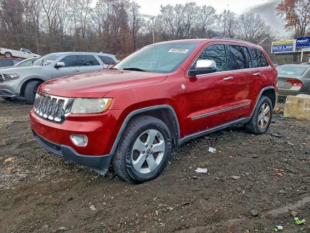 JEEP GRAND CHER 2011 with VIN 1J4RR4GT7BC527341 - Photo from auction