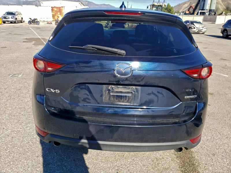 Photo 6 from auction – 2021 MAZDA CX-5 GRAND with VIN JM3KFADMXM1324932