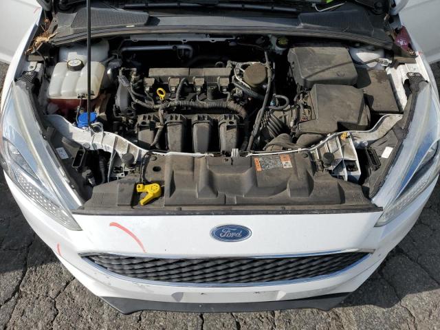 Photo 11 from auction – 2015 FORD FOCUS SE with VIN 1FADP3F20FL300352